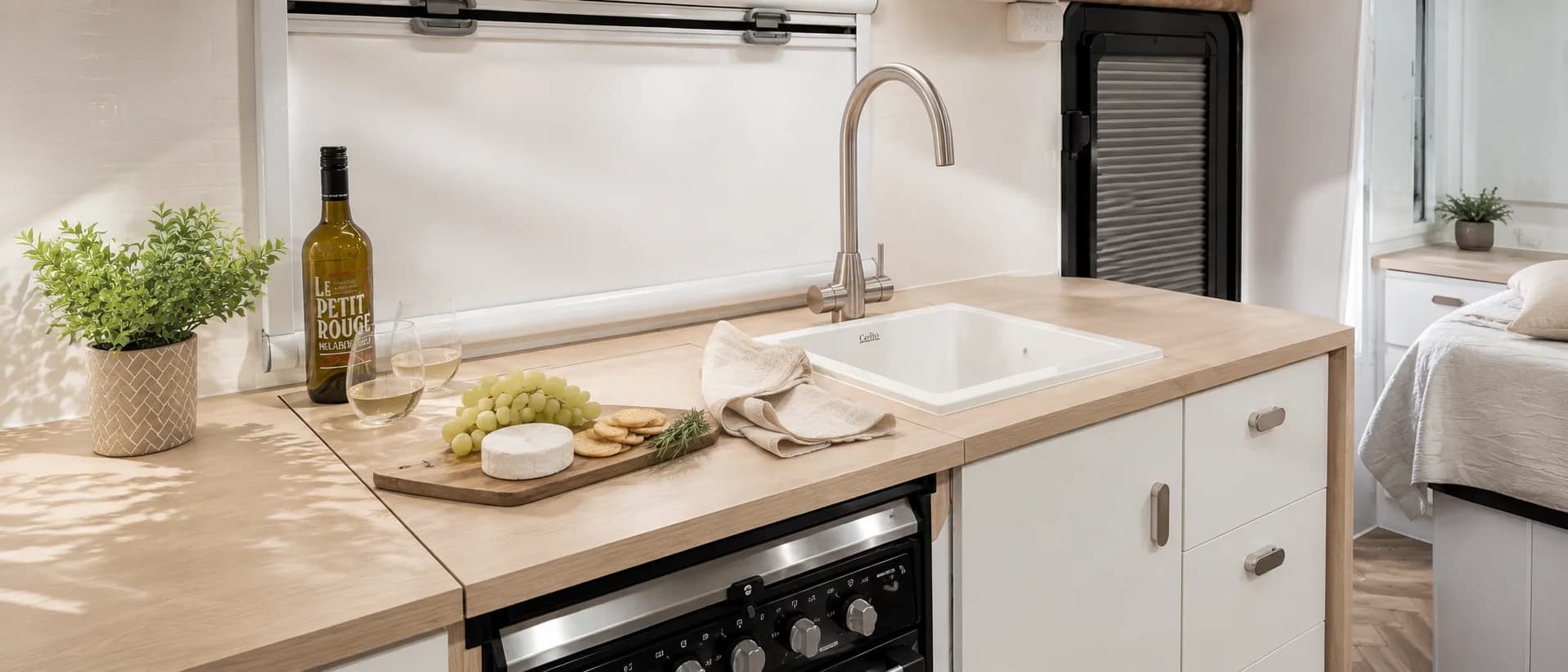 Timber benchtop and kitchen detail inside a Canyon