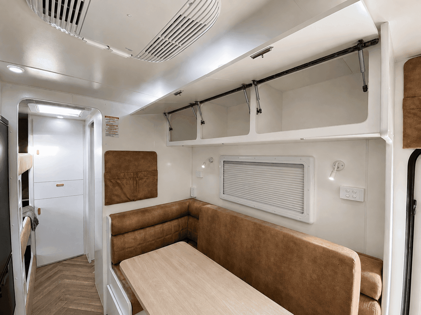 Classic Gold — café dinette and overhead lockers