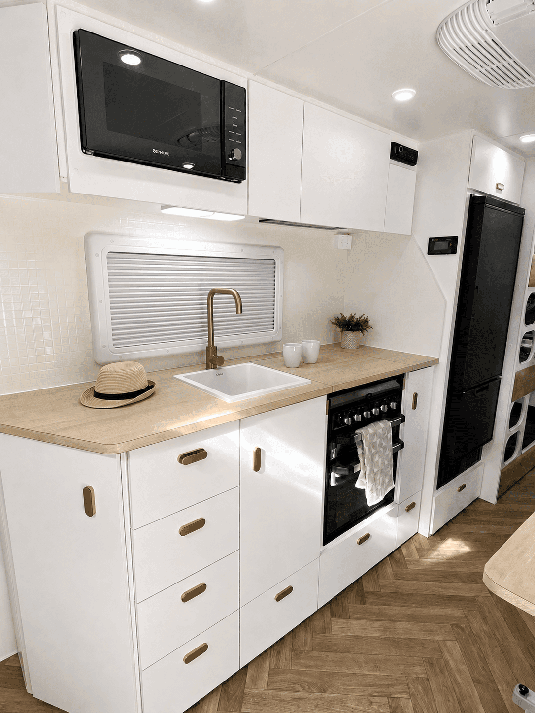 Classic Gold — kitchen with brushed-gold tapware