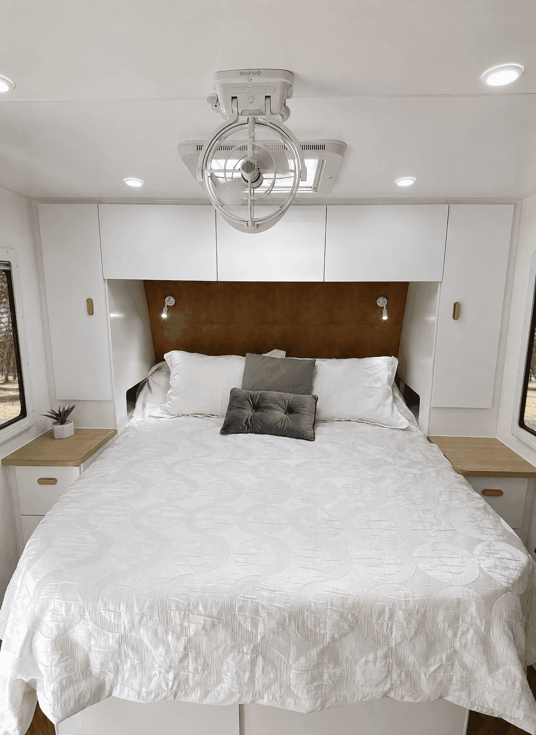 Classic Gold — queen bed with tan leather bedhead